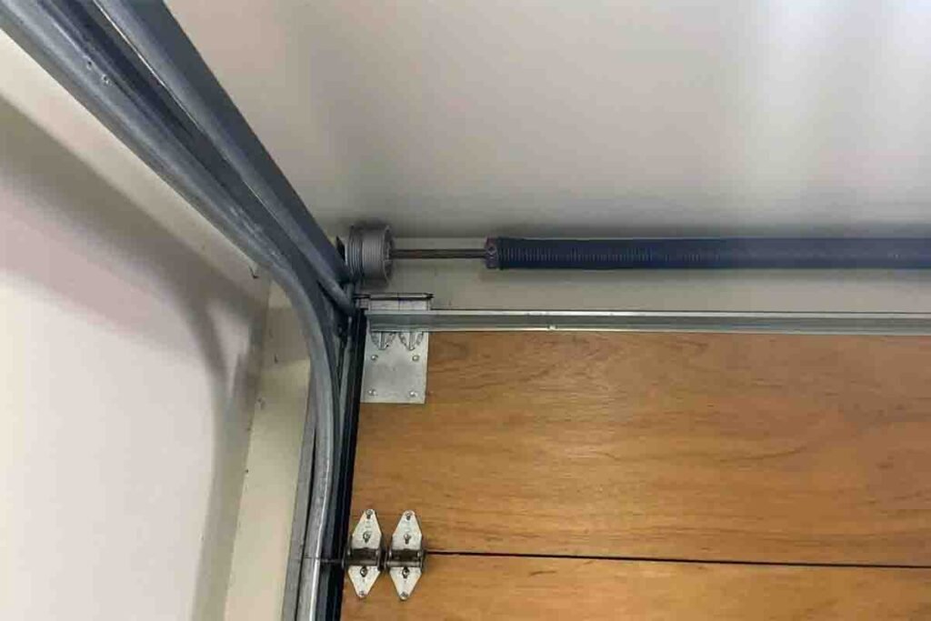 Close-up of torsion and extension springs side by side