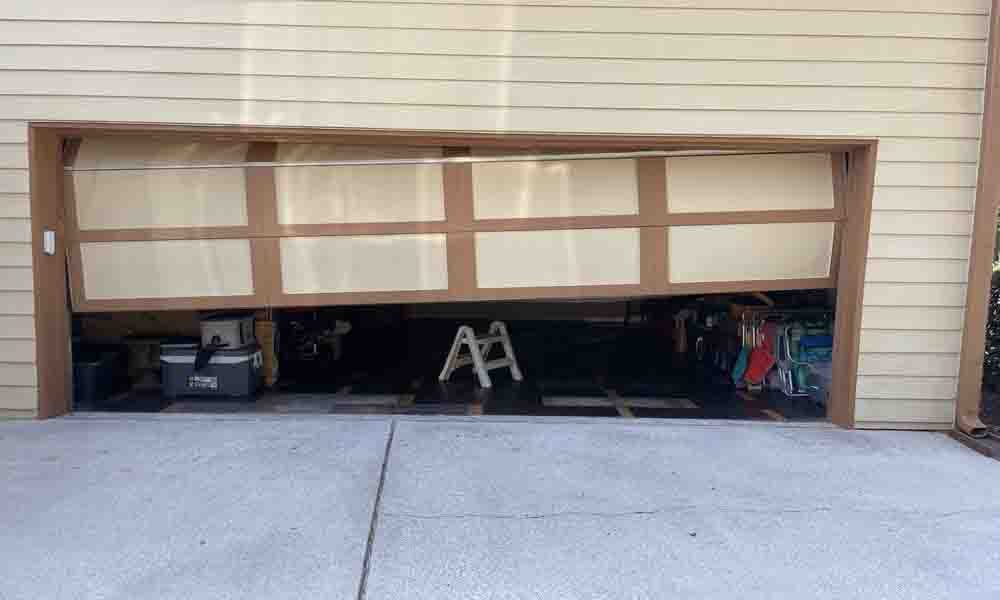 liftmaster garage door wheel realignment on track