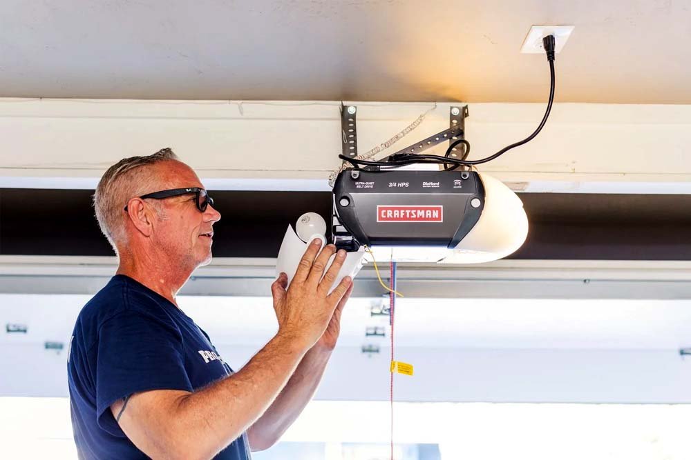 Belt drive garage door opener system