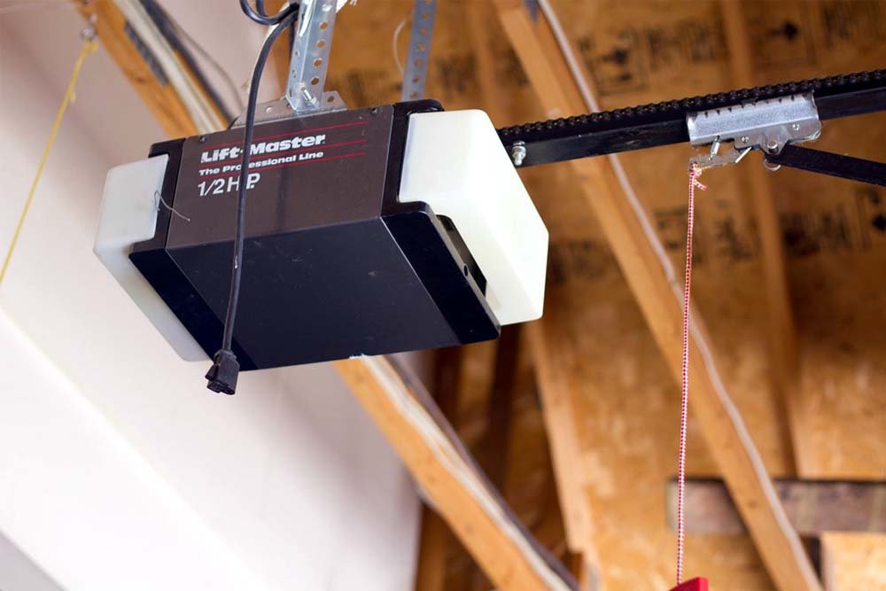 Chain drive garage door opener mechanism