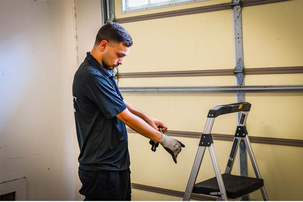 garage door bottom weather stripping installation with tools and materials