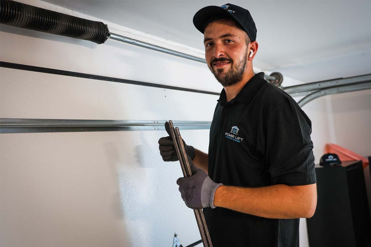 How much is slide to side garage door cost in 2026