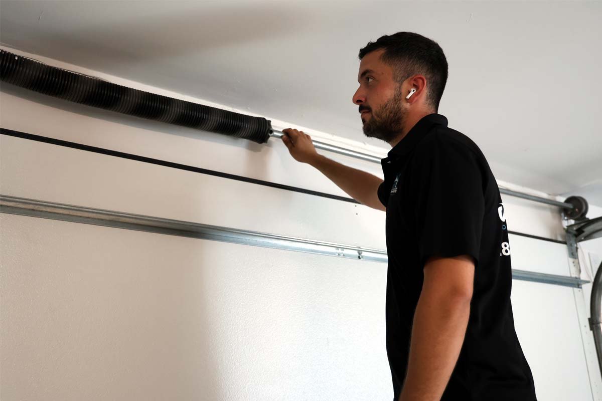 Signs a garage door motor needs replacement.